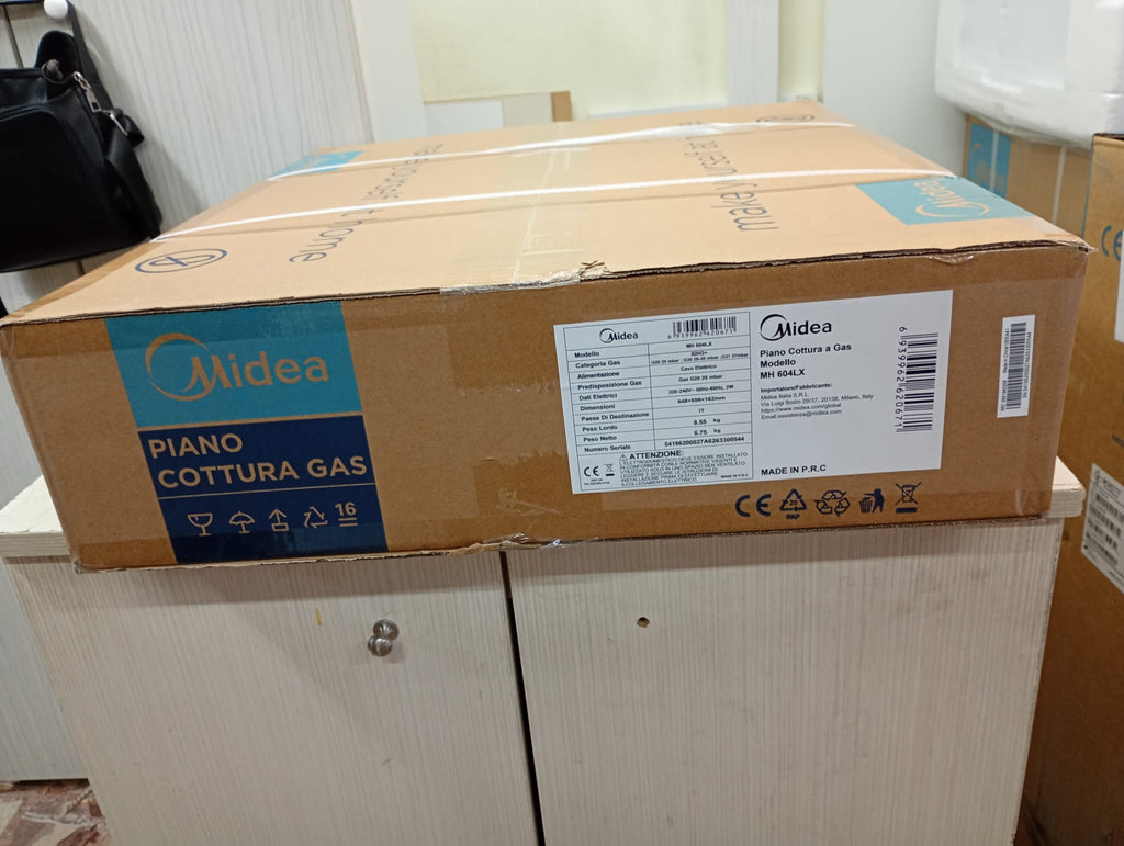 etichetta piano cottura midea con comandi laterali griglie smaltate con alvola sicurezza gas in acciaio inox satinato