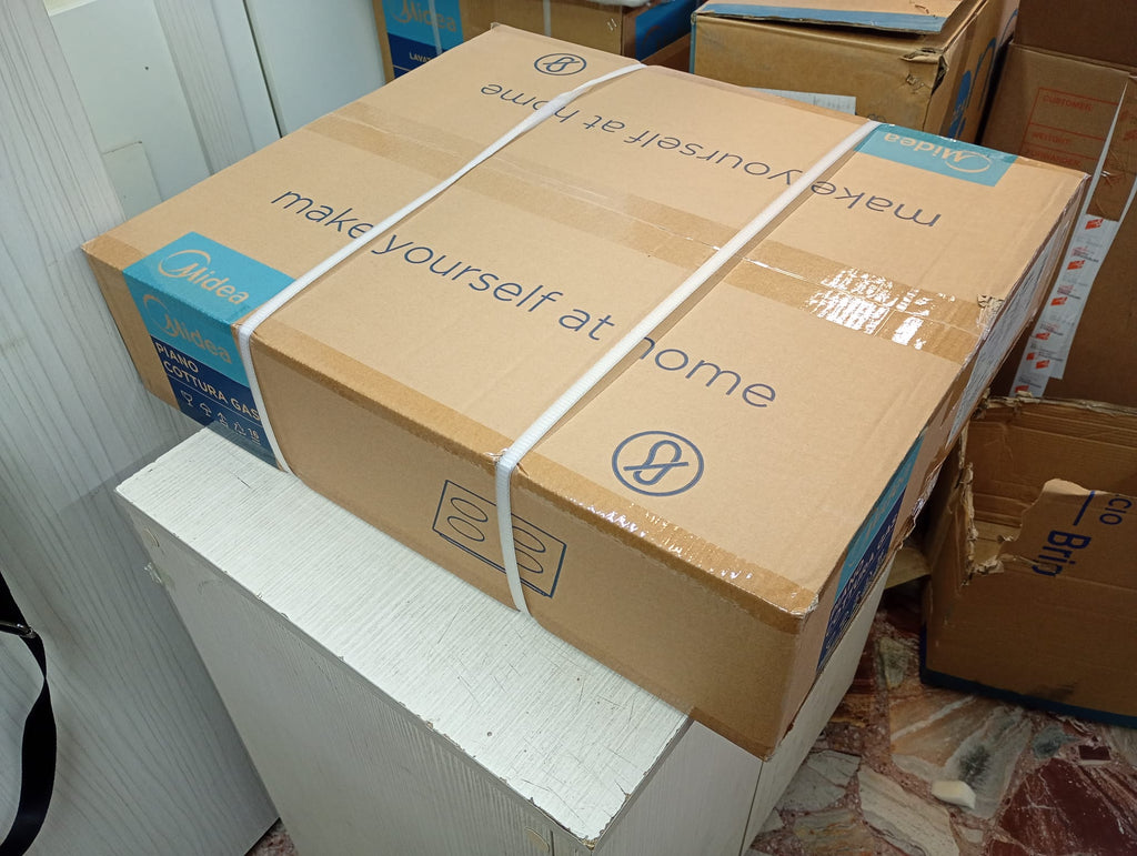 scatolo piano cottura midea con comandi laterali griglie smaltate con alvola sicurezza gas in acciaio inox satinato